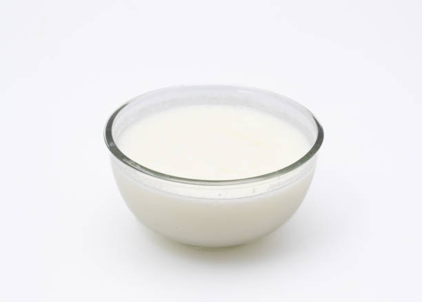 istock Home made yogurt on glass bowl on white background isolated 1600174577