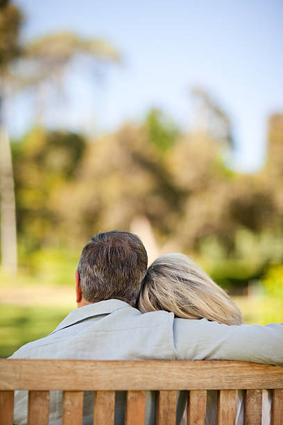 istock Elderly couple sitting on the bench 160017765