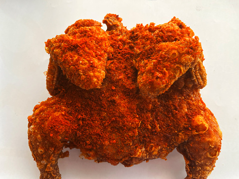 fried chicken with spicy seasoning taken from above as natural as possible