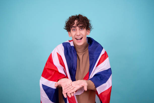 istock Young attractive guy with a britain flag. 1600222298