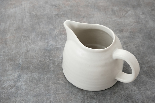 Traditional, handcrafted ceramic. Soft focus. Close up. Copy space.
