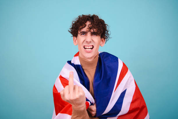 istock Young attractive guy with a britain flag. 1600230173