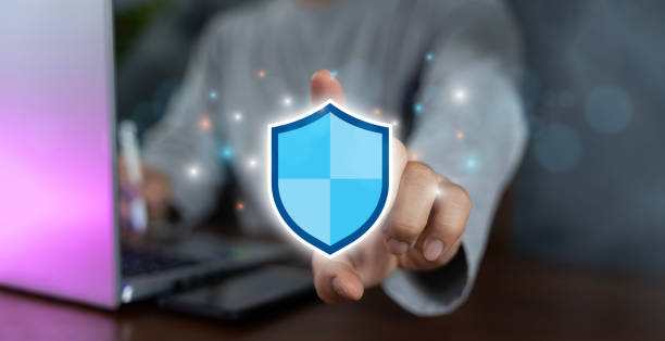 istock Cyber security and network protection concept, Businessman holding shield protect icon. cybersecurity concept Global network security technology. 1600235542