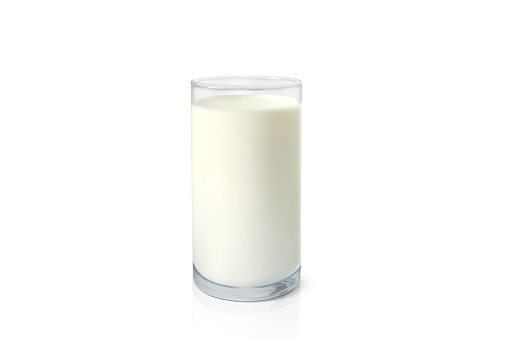 One glass of milk isolated on white background