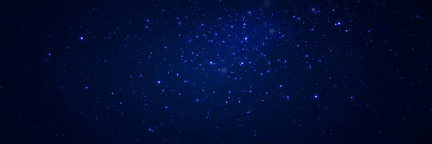 istock Abstract background. Beautiful blue starry sky. The stars glow in total darkness. 1600245645