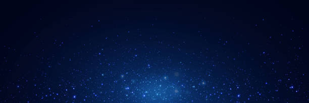 istock Abstract background. Beautiful blue starry sky. The stars glow in total darkness. 1600246762