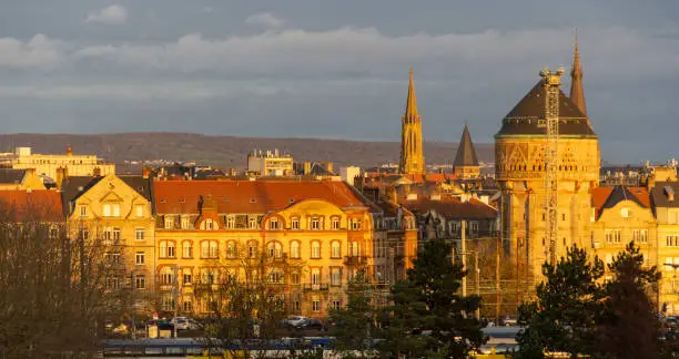 Sunny illuminated high angle view of Metz, a city in the Lorraine region at northeast France at evening time