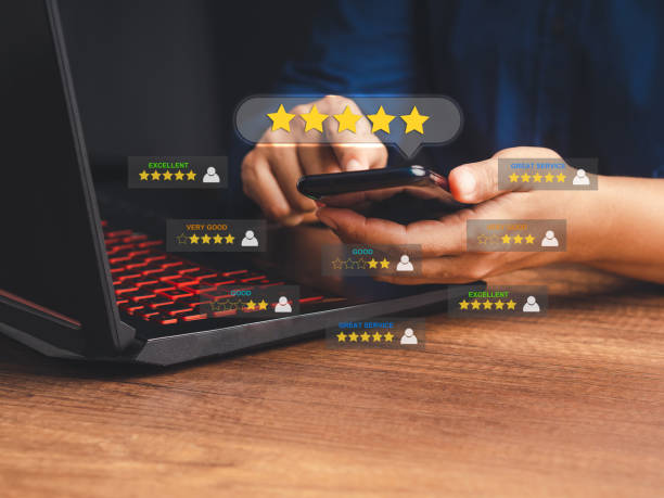 istock Man using a smartphone give the five-star icon a rating of very impressed for service 1600320033