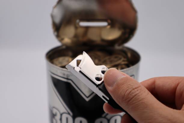 istock Person with can opener 1600323333