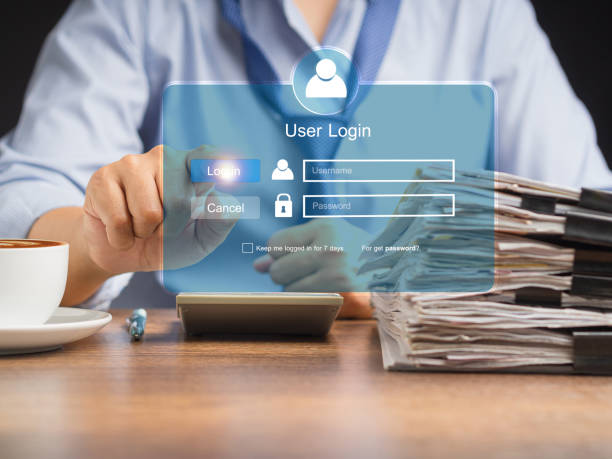 istock Businessman touching login button to the network system on a virtual screen 1600326770