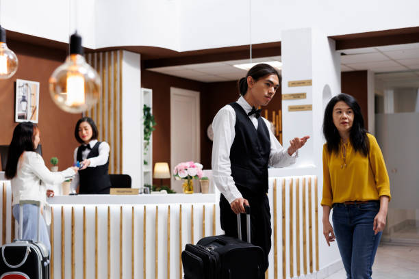 istock Guest receiving direction from staff 1600365933