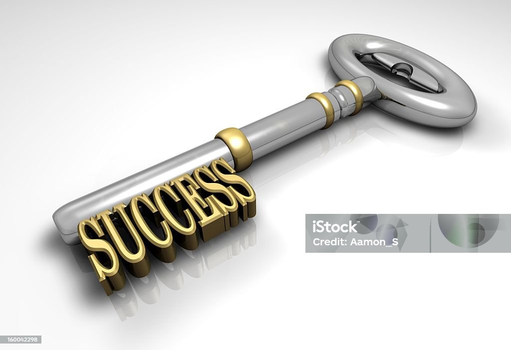 Silver key with Success in gold on a white background A symbol of business success. Abstract Stock Photo