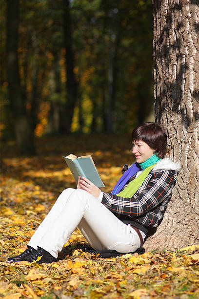 istock Yound woman is reading 160042923