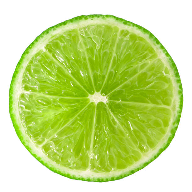 istock Fresh lime half sliced circle isolated on white background. 1600431499