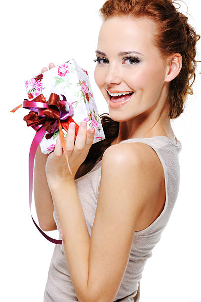 istock happy joy young female with a gift 160043507