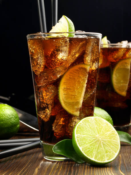 istock Cuba Libre Cocktail on wooden Table 1600436896