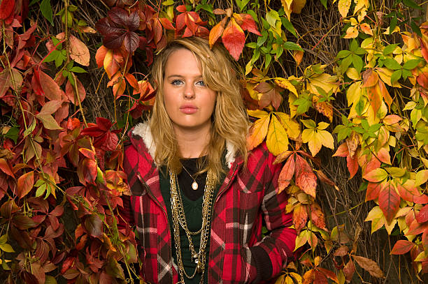 Girl Protrait with autumn leafs stock photo