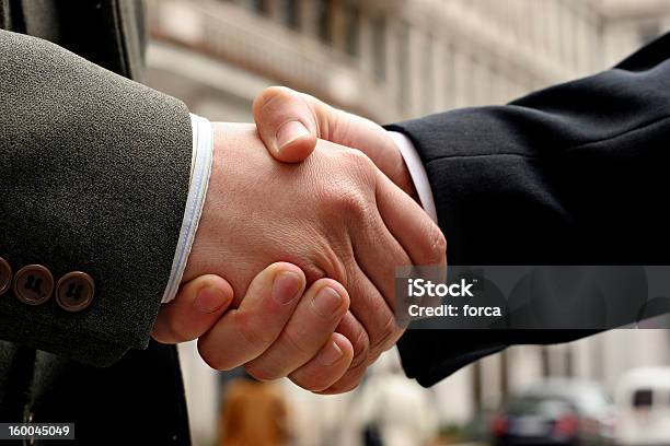 Handshake Stock Photo - Download Image Now - Adult, Agreement, Built Structure