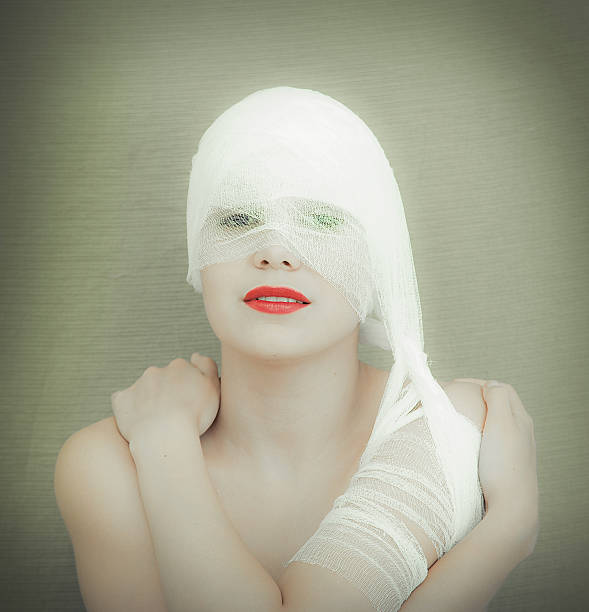 istock woman in bandage 160045076