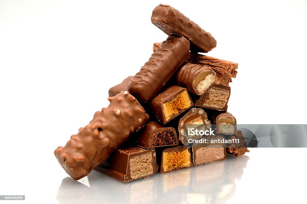 A pyramid made out of chocolate bars Pyramid of Chocolate Chocolate Bar Stock Photo