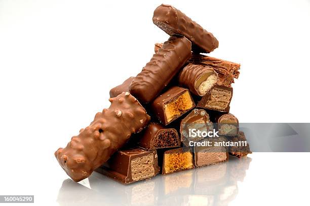 A Pyramid Made Out Of Chocolate Bars Stock Photo - Download Image Now - Chocolate Bar, Stack, Large Group Of Objects