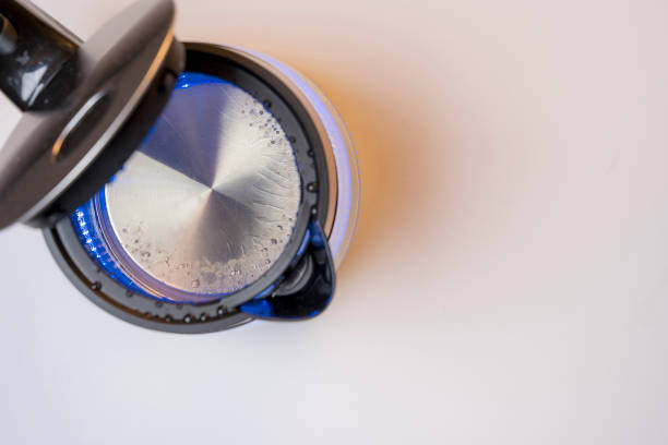 istock new modern boiling glass electric kettle close-up with bubbling water 1600454612