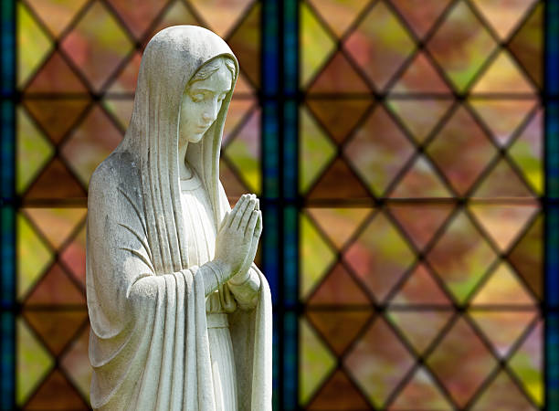 istock Isolated statue of Mary against window 160045946
