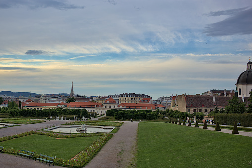 Vienna, Austria - June 27, 2023: View of the park and the city from the Upper Belvedere Palace in Vienna. The Belvedere Gallery is a popular place among tourists. Parks of the old city.