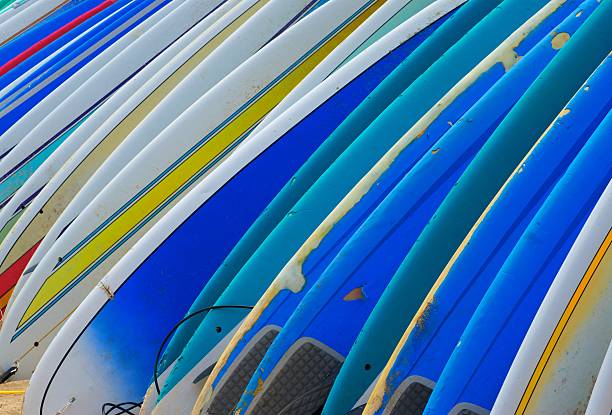 istock Row of Brightly Colored Surf Boards 160048571