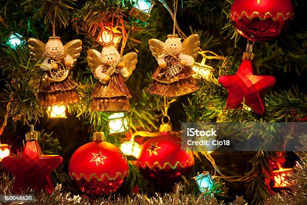 Musician Angels Hanging On The Christmas Tree Stock Photo - Download Image Now - Angel, Branch - Plant Part, Celebration