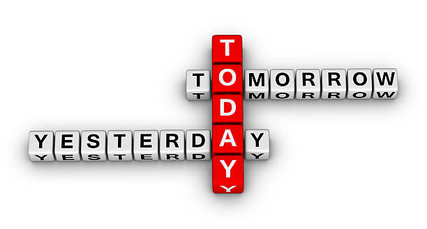昨日、今日も明日も crossword - today tomorrow yesterday time ストックフォトと画像