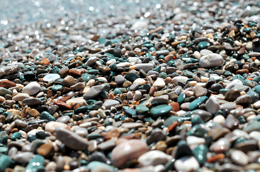 multi-colored sea pebbles closeup background
