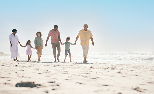 Mockup, love and family on beach, walking and happiness for summer vacation, quality time and relax. Grandparents, mother and father with children on seaside holiday, ocean water waves and traveling