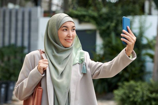 istock Muslim Woman Taking Selfie 1600500403