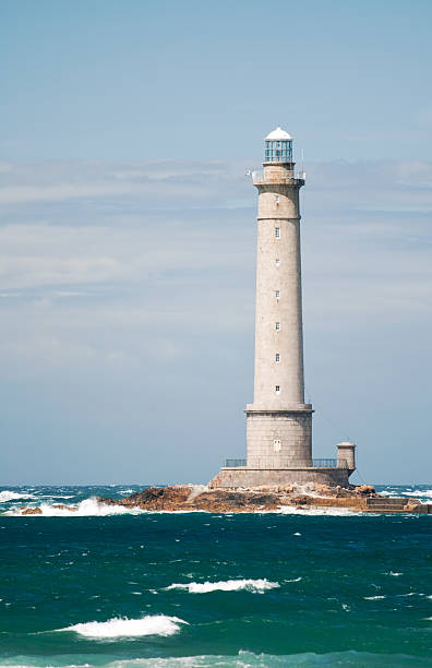 istock Lighthouse in the sea 160050312