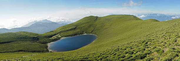 panorama mountain landscape with beautiful blue lake scenery. stock photo