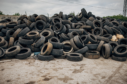 Pile of rubber tyres in the recycling center