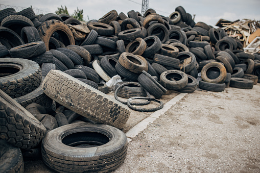 Pile of rubber tyres in the recycling center