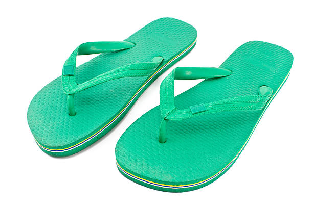istock Pair of green rubber flip flop sandals 160050980