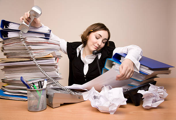istock Young businesswoman with tons of documents 160051096