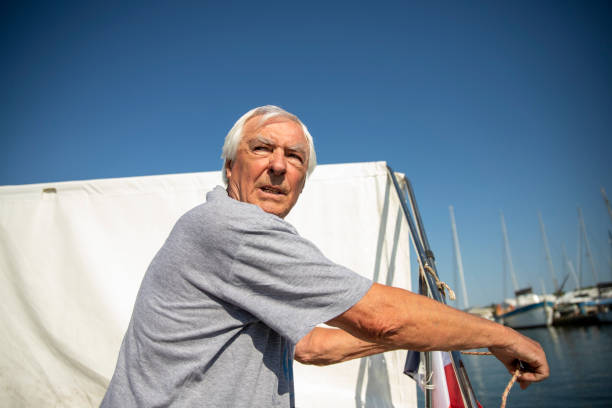 istock Senior Man sailing on the boat 1600513091