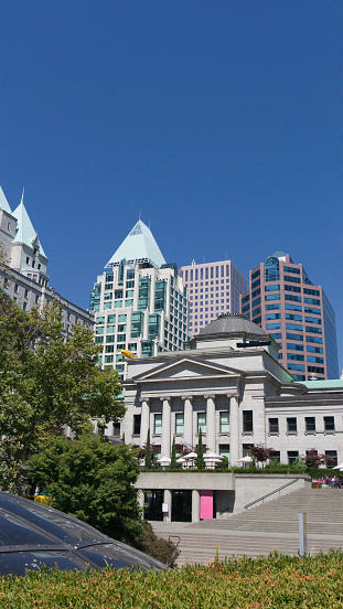 Vancouver Art Gallery in front of Cathedral Place - Vancouver, British Columbia, Canada