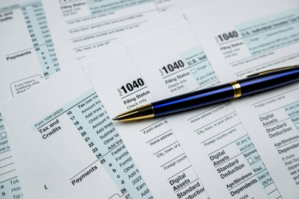 istock pen on blank 1040 Tax Return Form 2022 1600521682