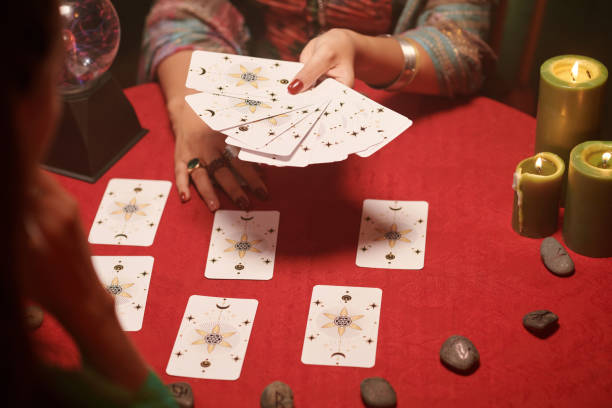 istock Seer Asking to Choose Cards 1600527901