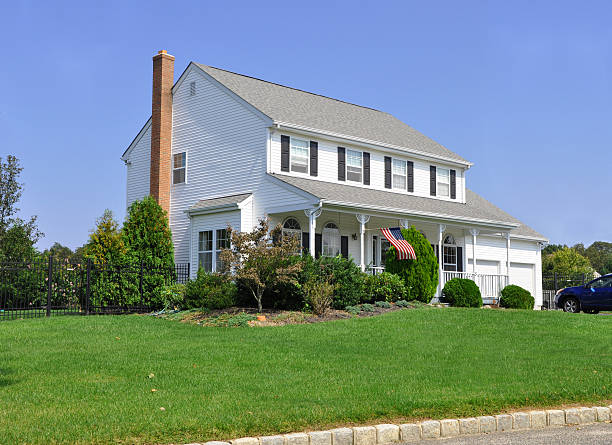 istock Suburban Home with Waving American Flag 160053493
