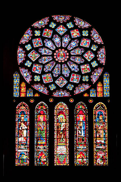 Rose window of Chartres cathedral Vitrages of famous Notre Dame cathedral in Chartres, France chartres cathedral stock pictures, royalty-free photos & images