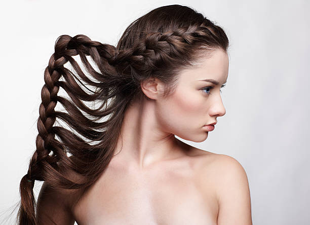 istock A girl with brown hair in waterfall braids 160053986