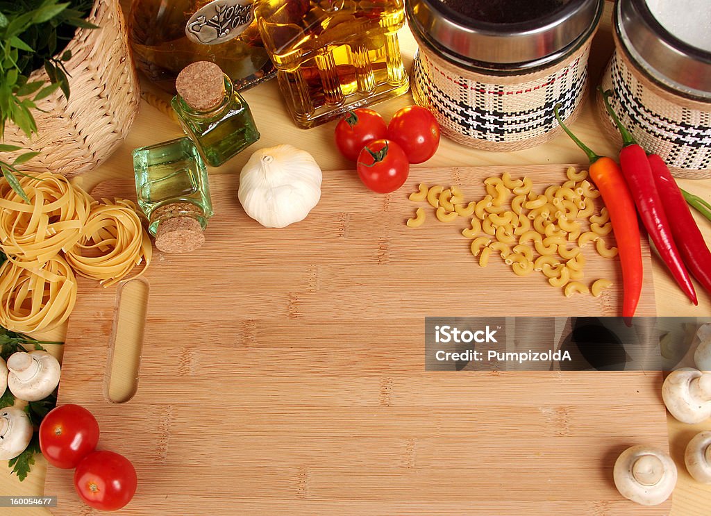 table fresh vegetables, macaroni and olive oil on table Chili Pepper Stock Photo