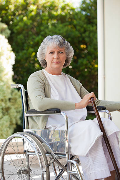 istock Senior woman in her wheelchair 160056675