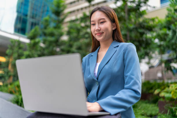 istock Efficiency Unleashed. Young Asian Businesswoman Empowers Business on the Go 1600586759